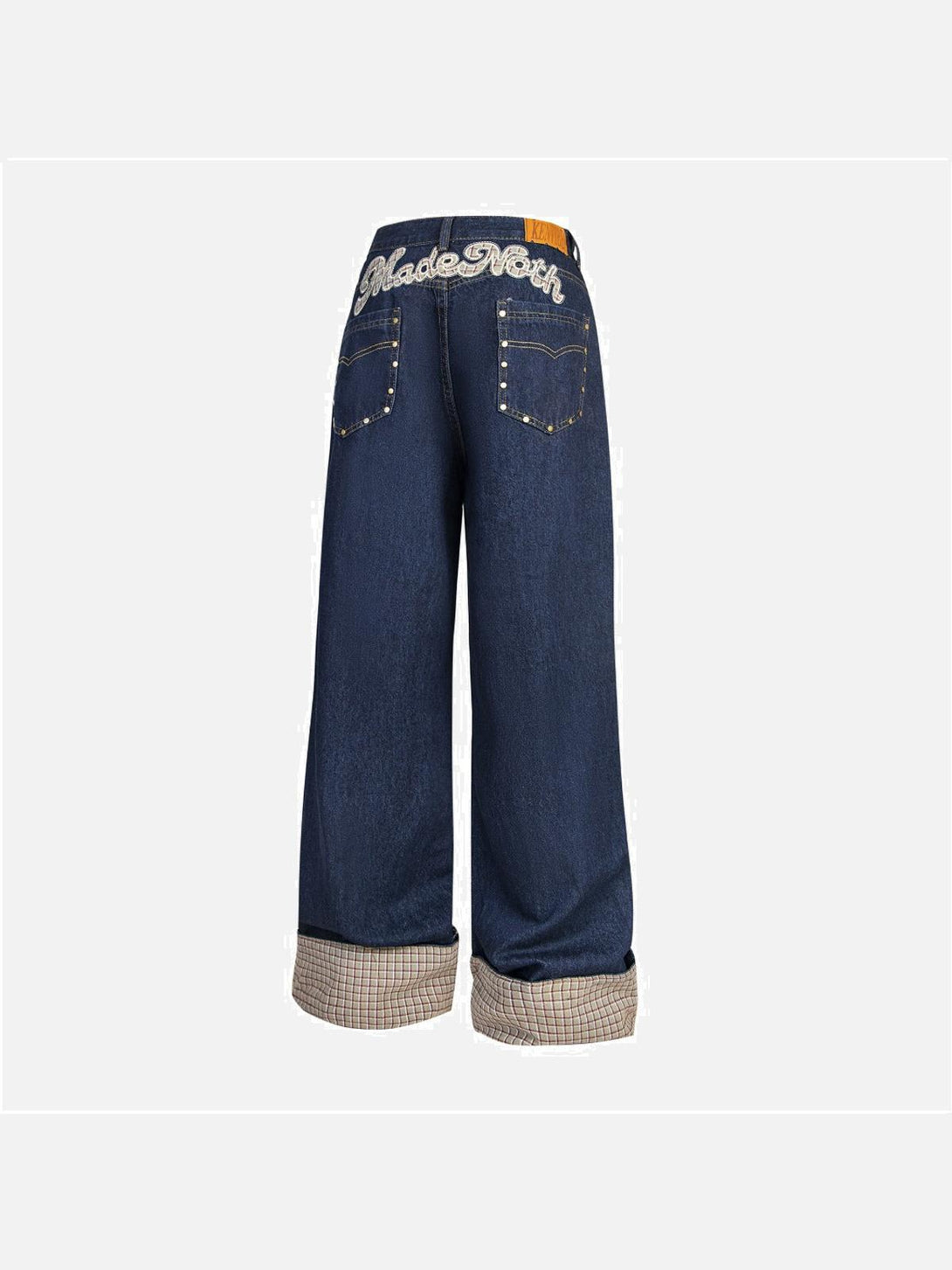 TALISHKO plaid panel jeans from the back, featuring embroidered accents and rolled cuffs.