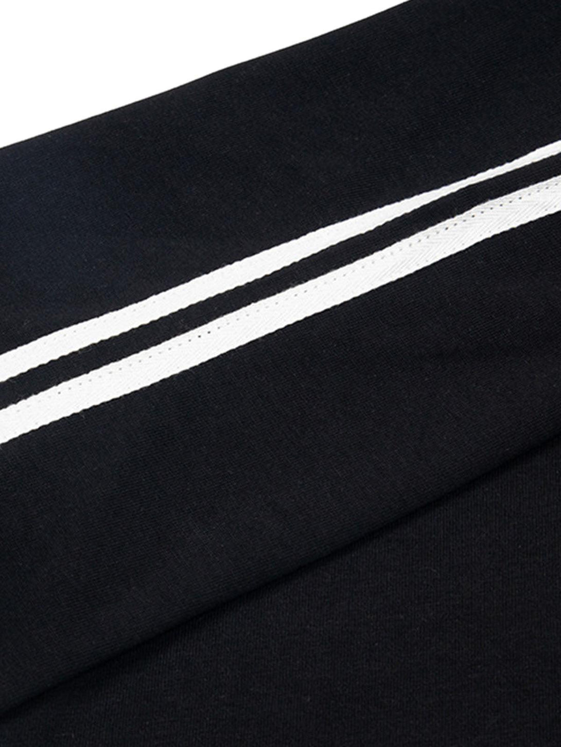 Detailed fabric and stitching on TALISHKO T-shirt, showcasing texture and striped design.