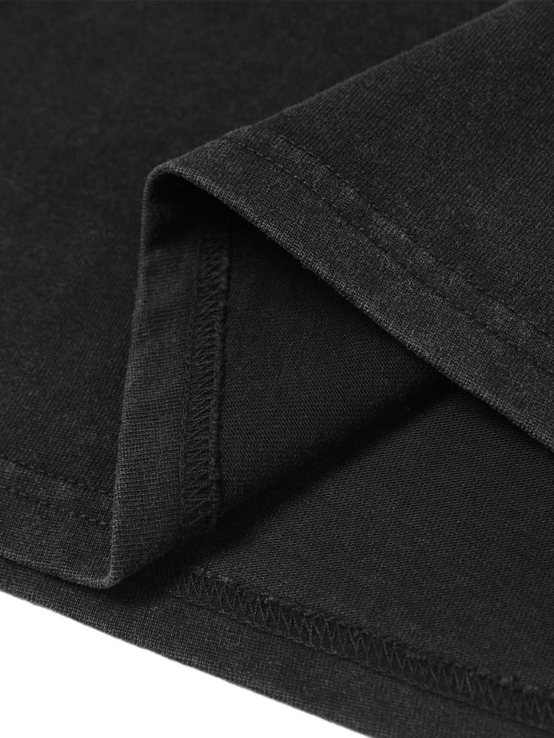 Detailed fabric and stitching of TALISHKO polo T-shirt, highlighting its sleek craftsmanship.