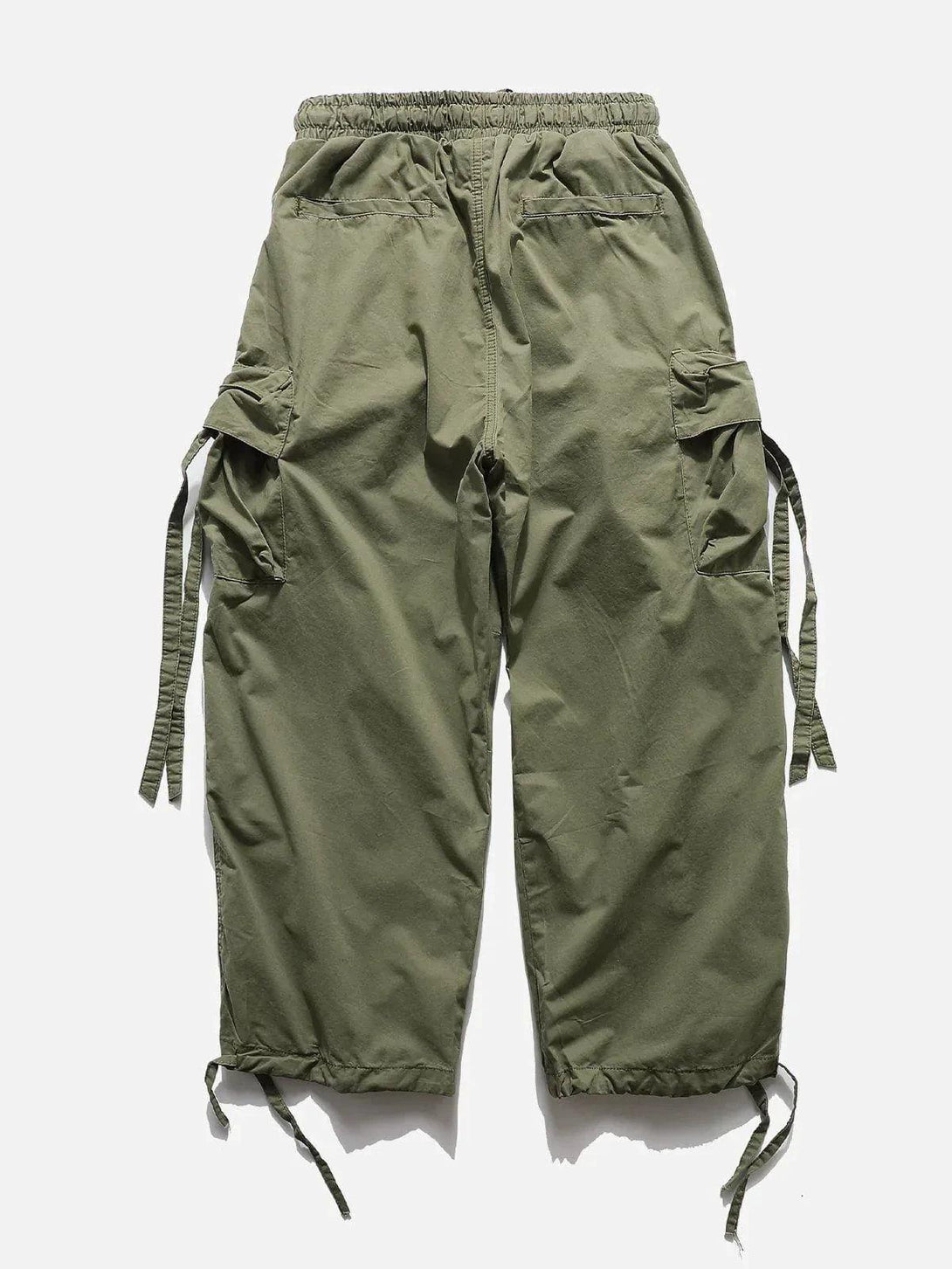 Olive green pants with flap pockets by TALISHKO, showcasing a relaxed, casual fit.