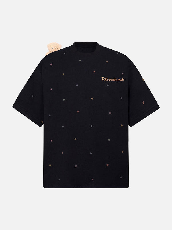 Black polka dot t-shirt with a playful bear detail by TALISHKO, showcasing a fun summer vibe.