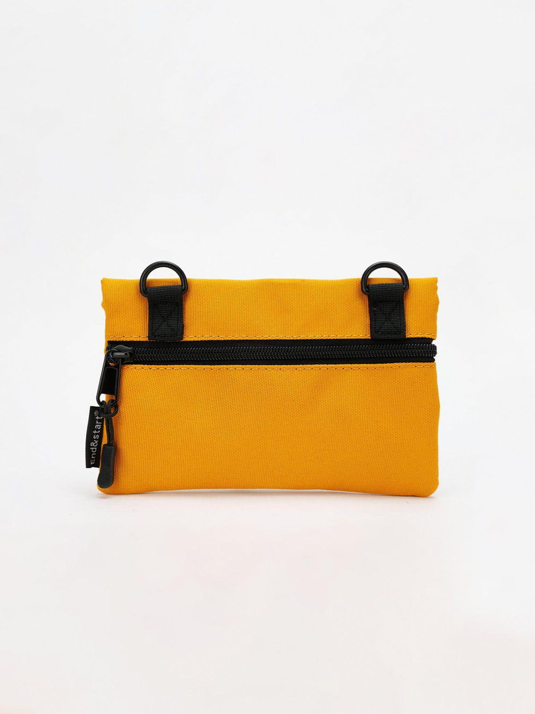 Front view of a vibrant yellow portable mini crossbody bag featuring black accents by TALISHKO.