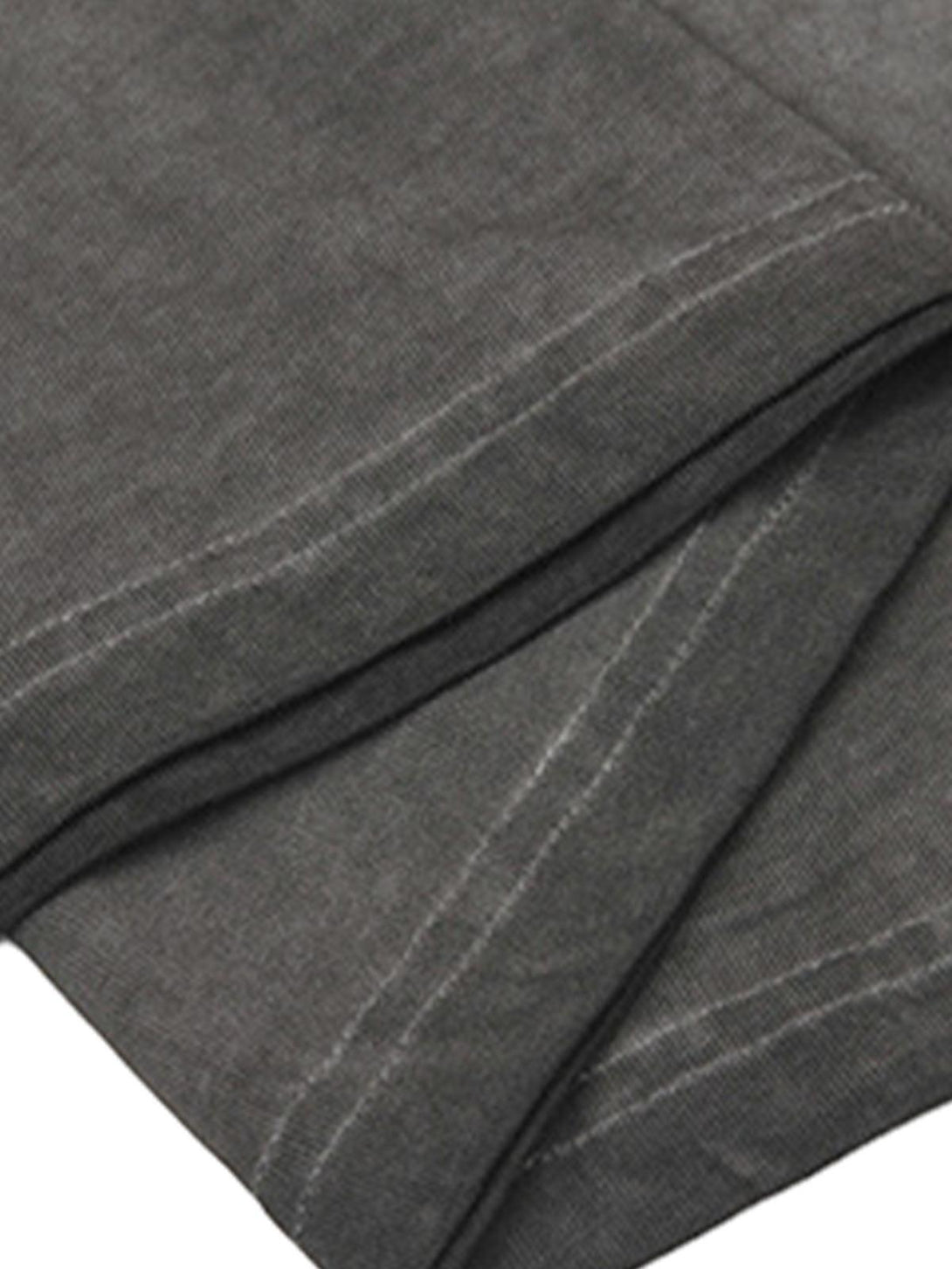 Detailed fabric and stitching of the TALISHKO crew neck T-shirt, highlighting quality craftsmanship.