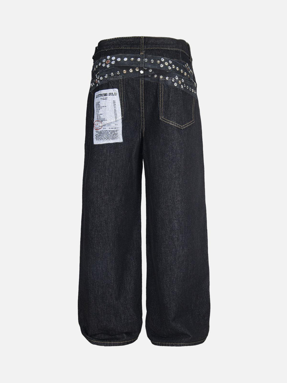 Back view of TALISHKO baggy jeans featuring stud details and a unique printed patch.