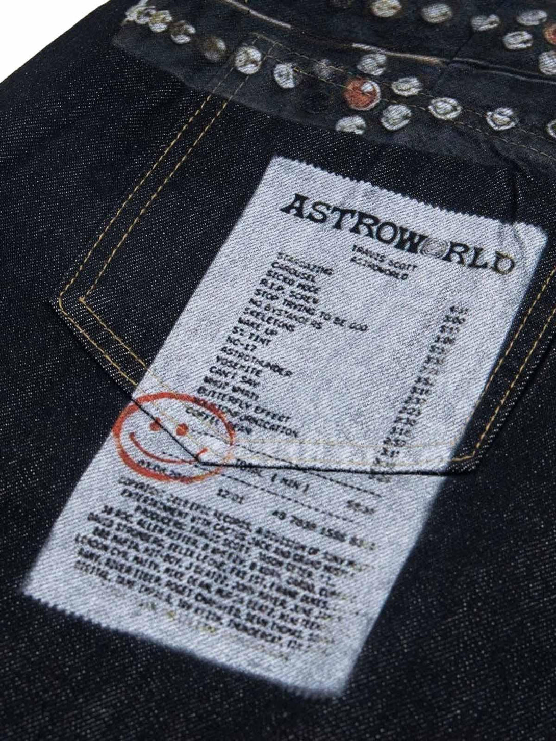 Zoomed-in on playful print and stitching detail of TALISHKO baggy jeans, showcasing unique style.