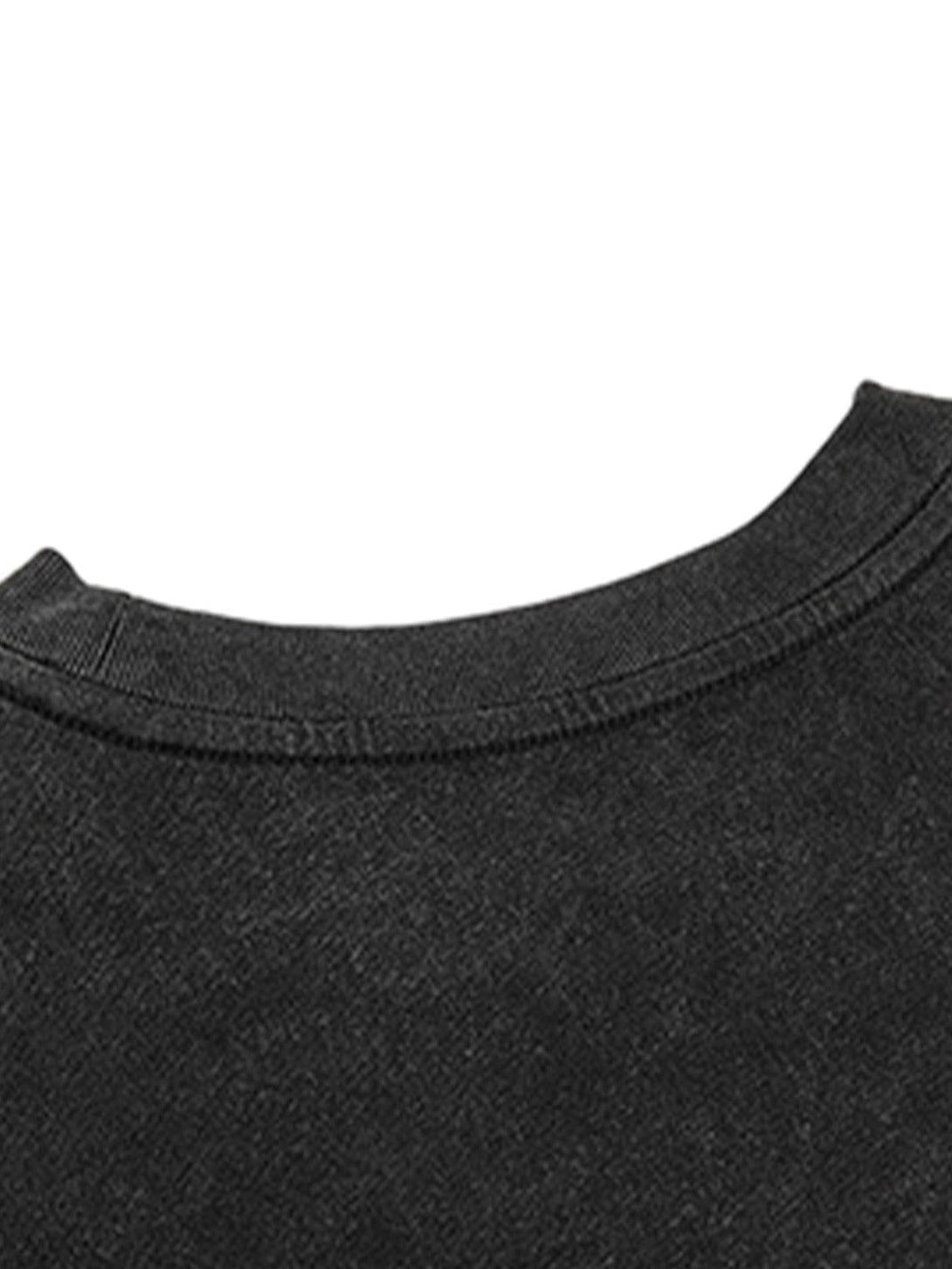 TALISHKO T-shirt neckline detail highlighting its soft, dark fabric texture.
