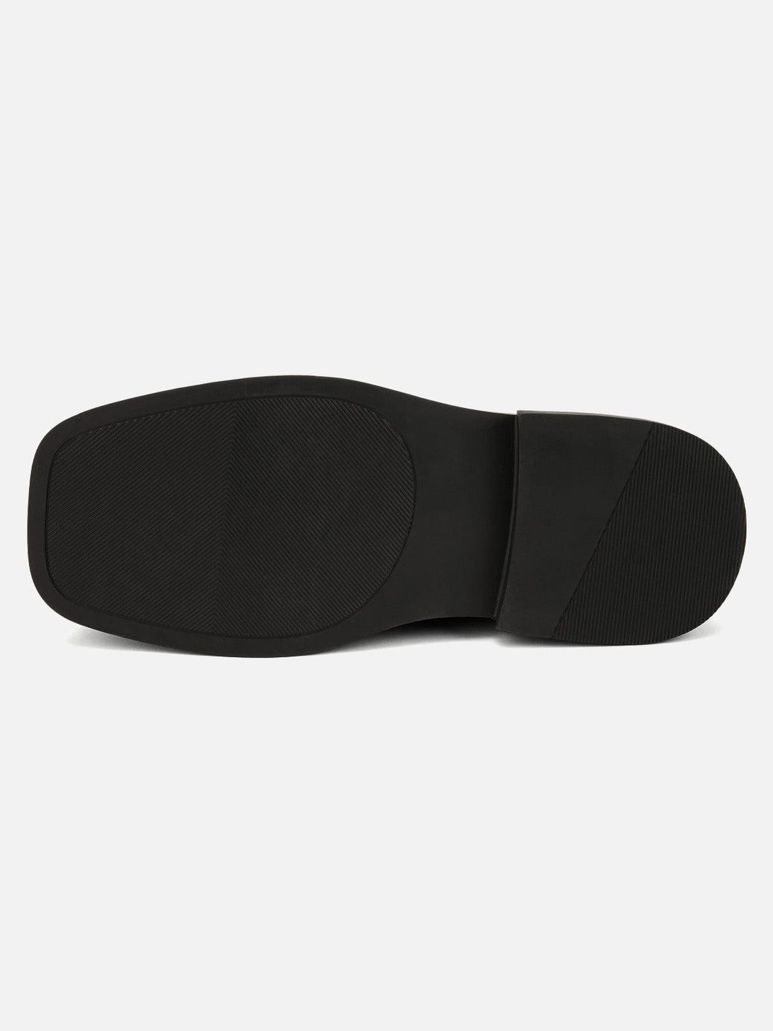 "Underside view of TALISHKO leather shoes, highlighting durable sole for long-lasting wear."