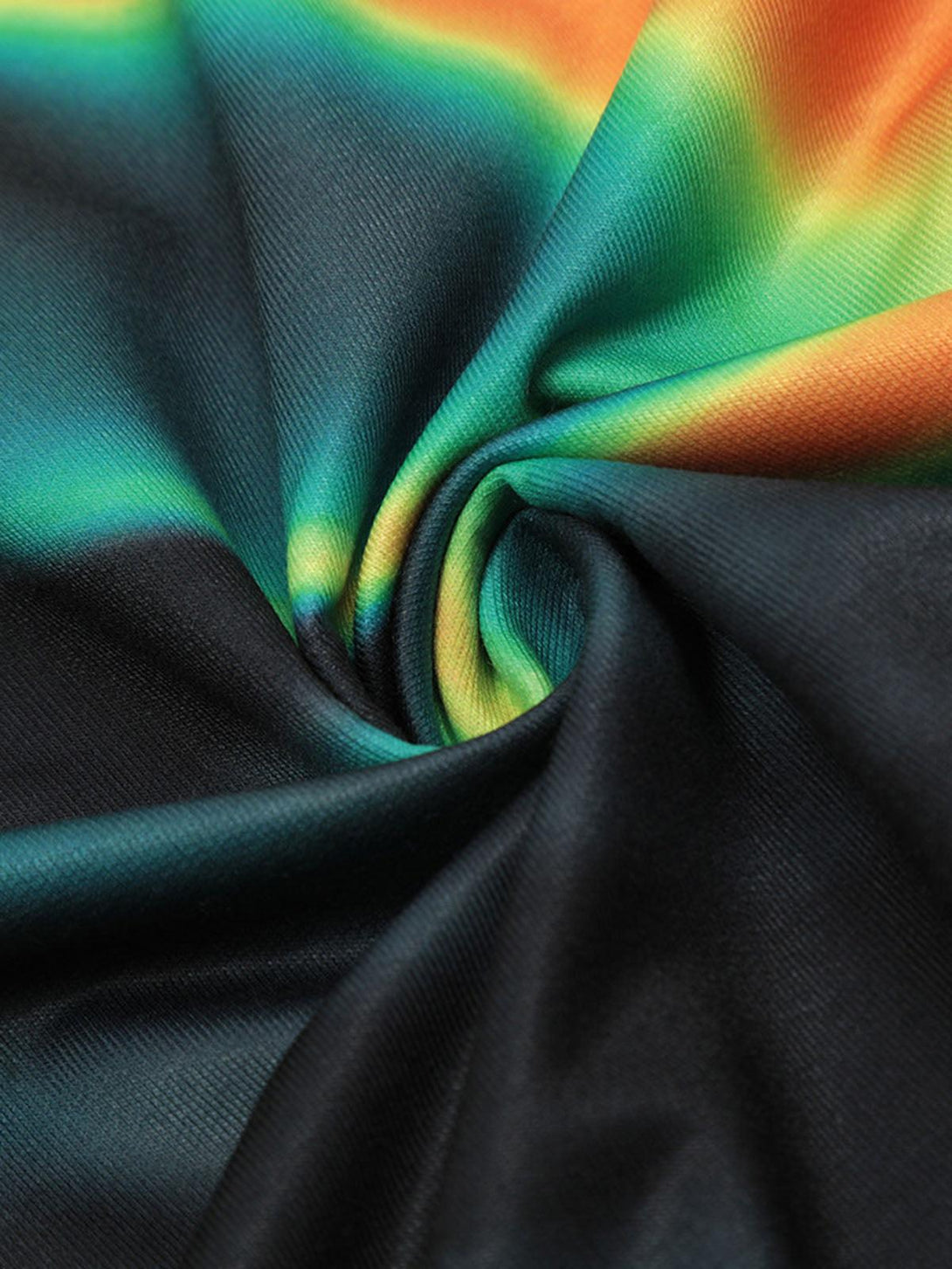 Intricate look at TALISHKO's quick-dry long sleeve T-shirt, featuring vibrant fabric swirls.