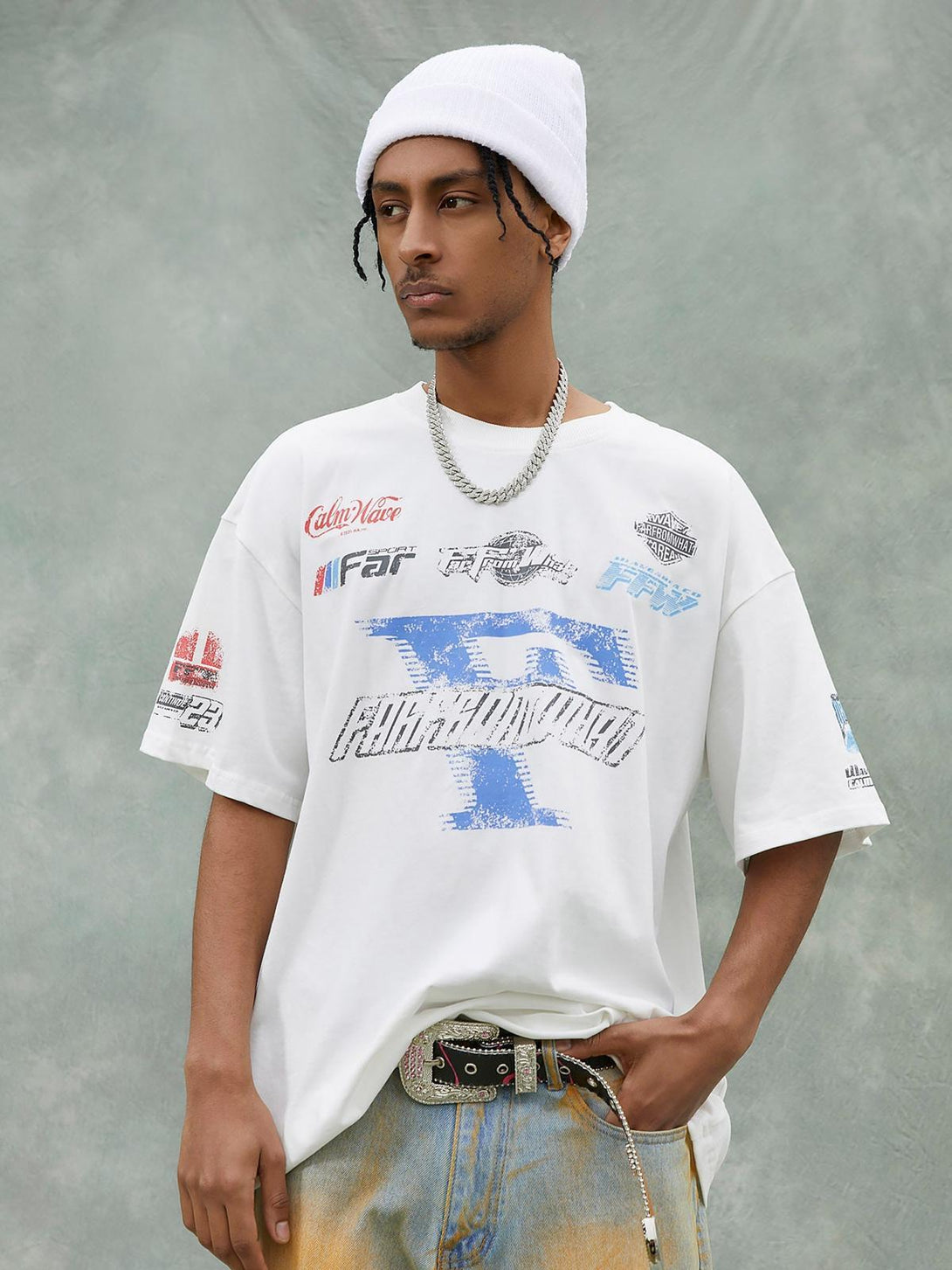 Model wearing a TALISHKO Racing Afterimage T-shirt with graphic prints and a relaxed fit.