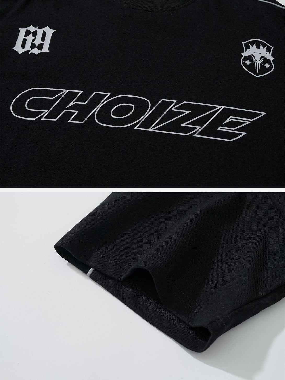 Close-up of TALISHKO racing elements stripe tee, featuring bold graphics on black fabric.