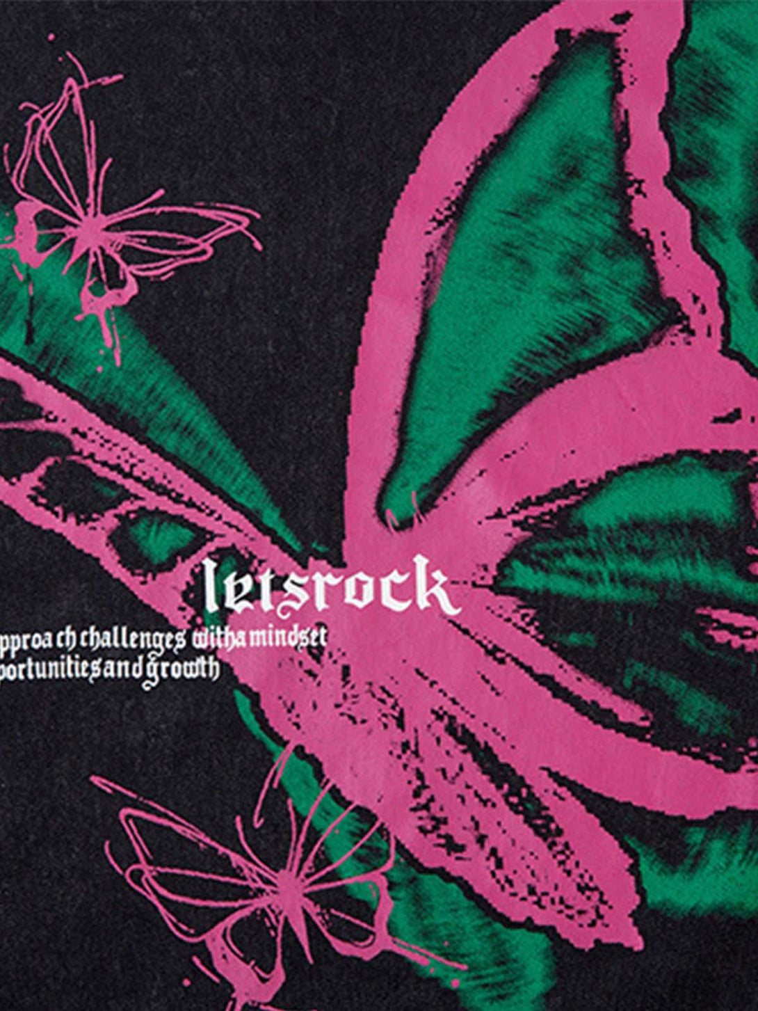 A vibrant butterfly design on a TALISHKO vest, highlighting raw edges and unique textures.