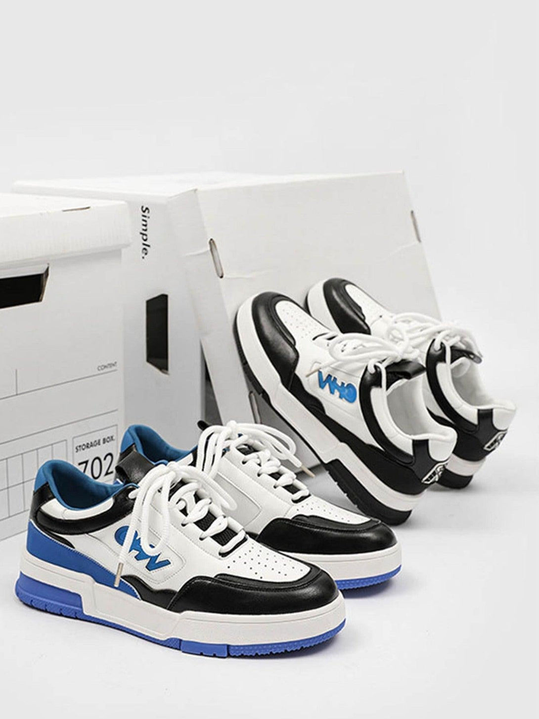 TALISHKO sneakers in black, white, and blue, highlighting a bold retro design.