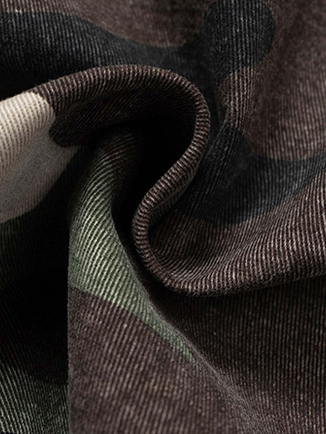 Texture and pattern showcased in TALISHKO's retro camouflage fabric, highlighting raw edge detail.