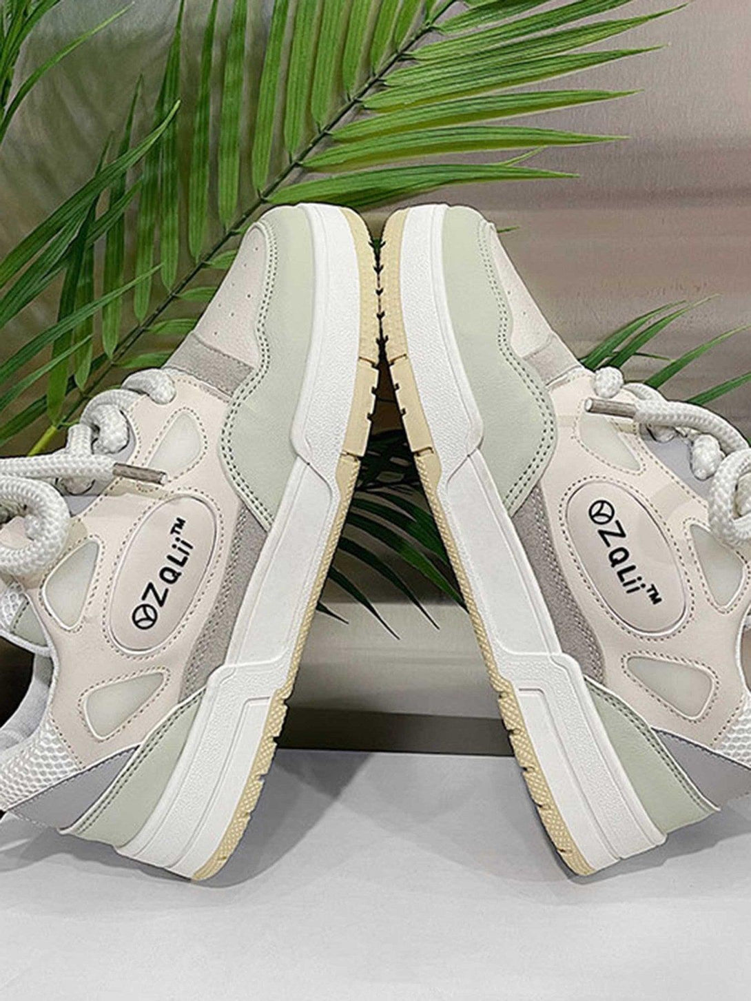 Retro board shoes by TALISHKO highlighting a stylish side view with neutral tones and textures.