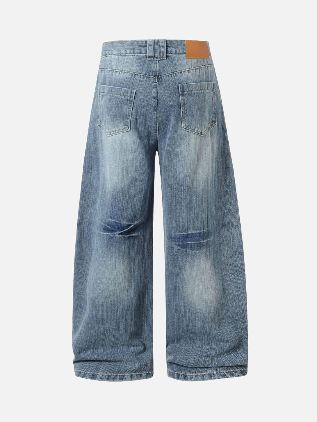 Back view of faded blue baggy jeans by TALISHKO, highlighting retro cleanfit design.