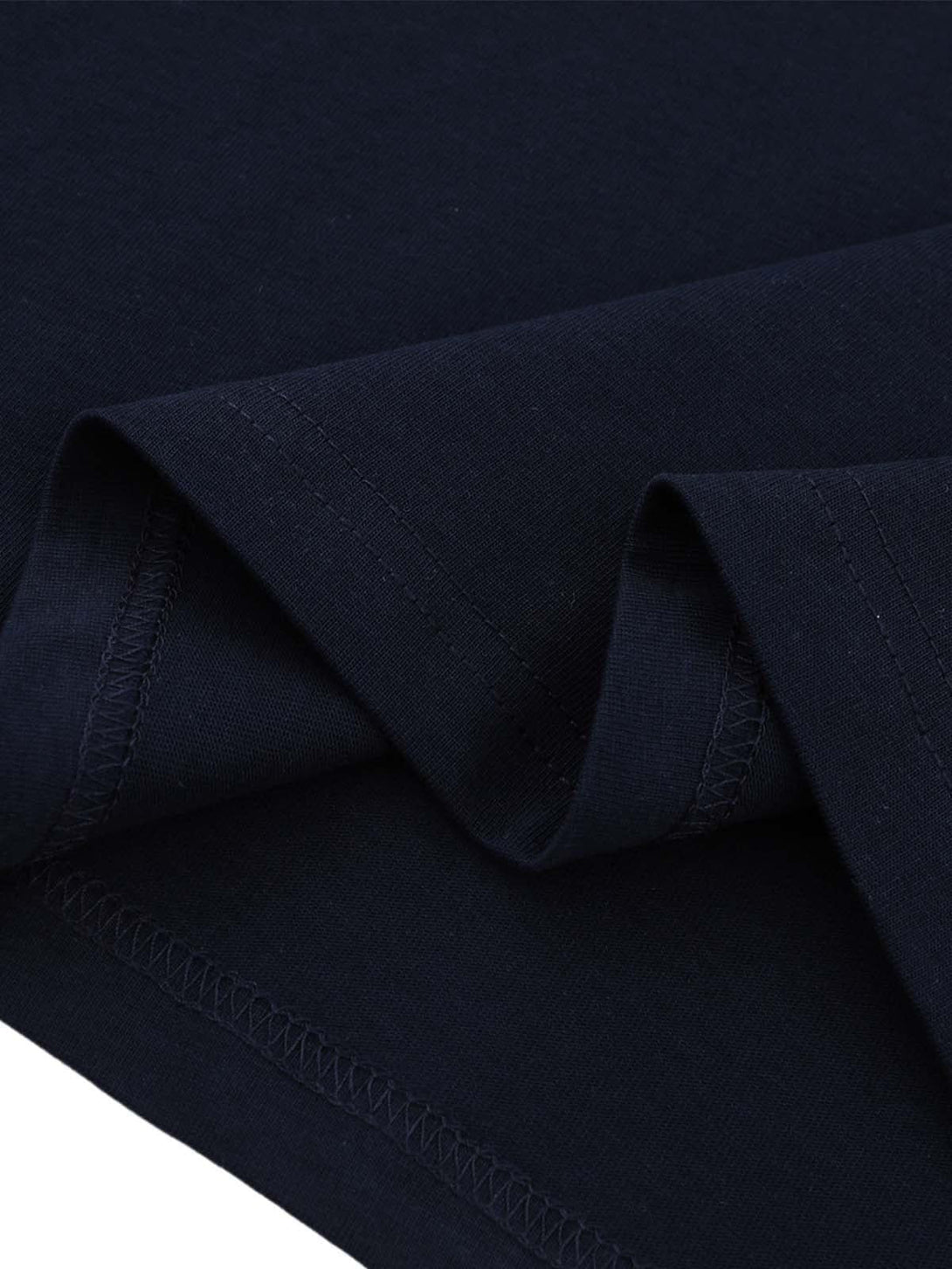 Detailed fabric and stitching of a TALISHKO jersey T-shirt, highlighting its craftsmanship.