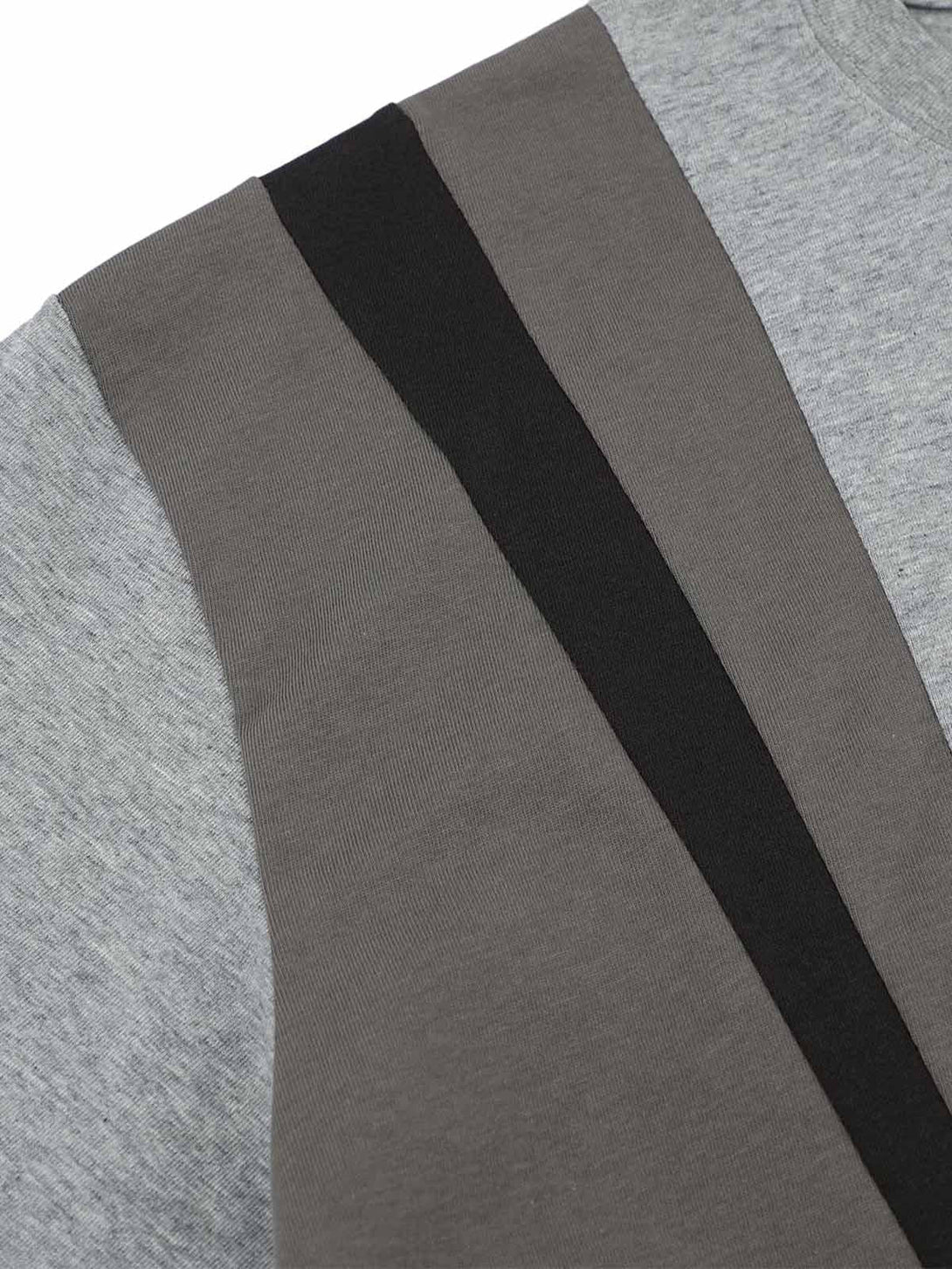 A close-up of TALISHKO T-shirt's fabric, highlighting its retro contrast stitching details.