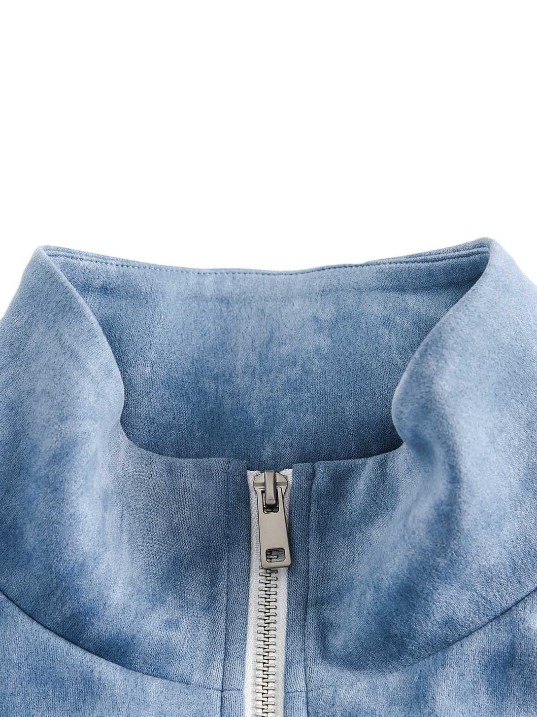 A close-up of the collar and zipper on a TALISHKO retro suede track jacket in blue.