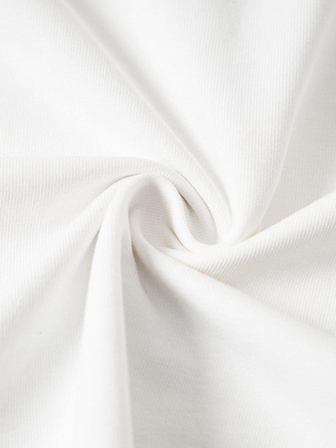 A detailed view of the TALISHKO T-shirt's fabric, showcasing its soft and smooth texture.