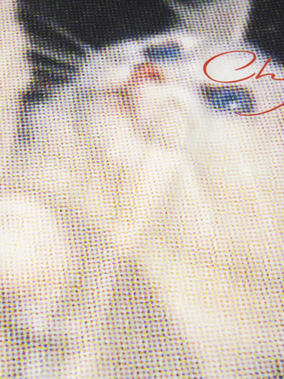 A close-up of the TALISHKO T-shirt's retro cat print, highlighting its playful design.