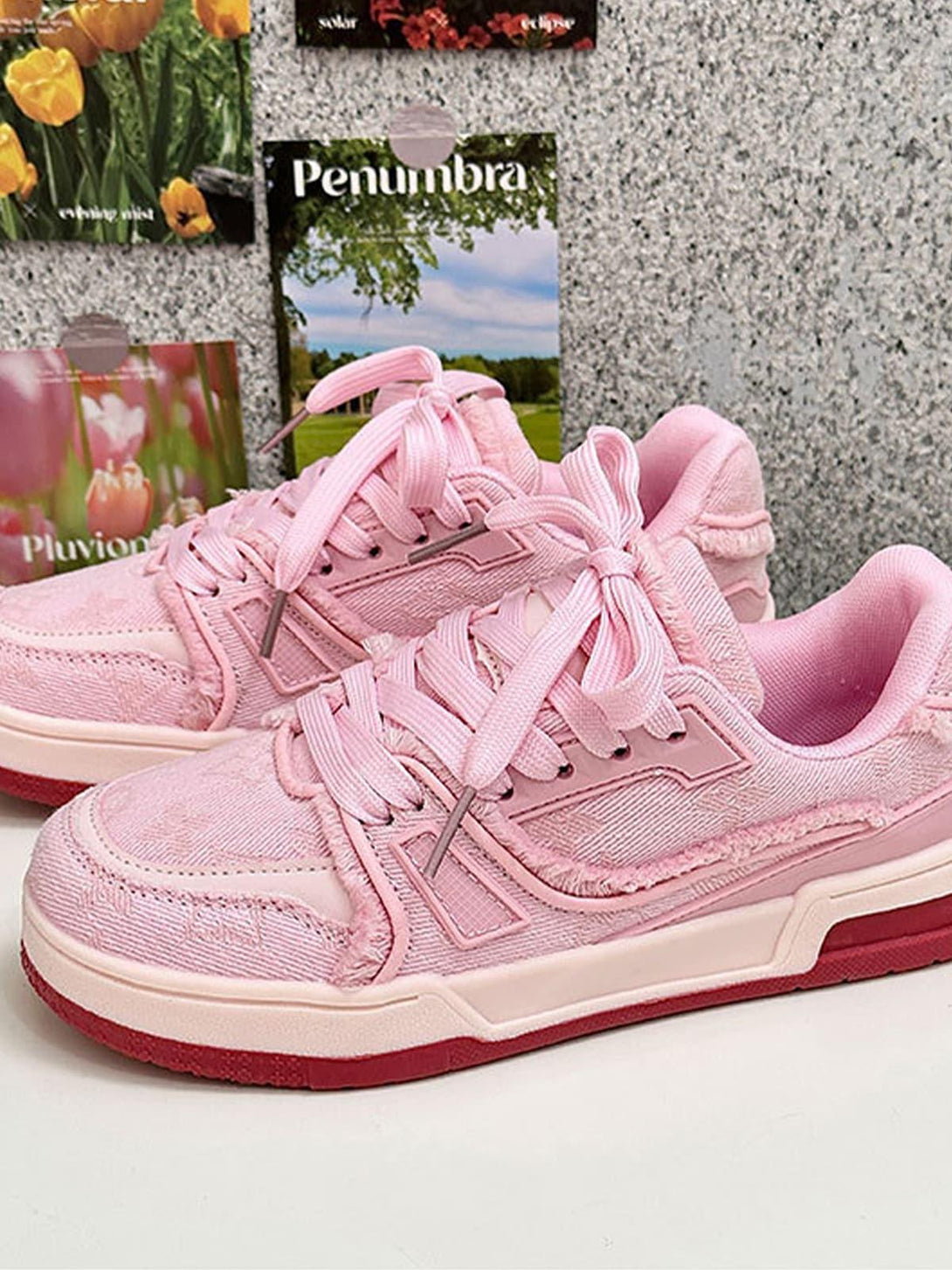 Stylish pink retro denim sneakers by TALISHKO, featuring a textured design and vibrant color.