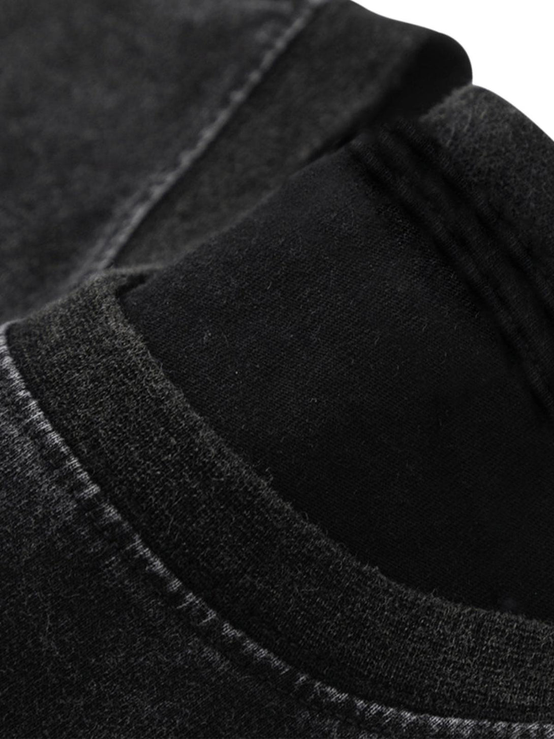 Detailed fabric and stitching of a retro street rap vest by TALISHKO, highlighting texture.