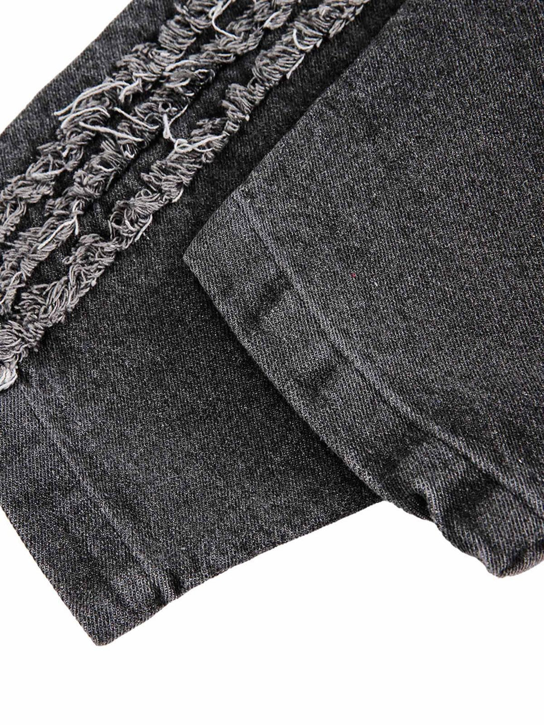 Intricate look at TALISHKO's retro distressed denim hoodie, highlighting the frayed detailing.