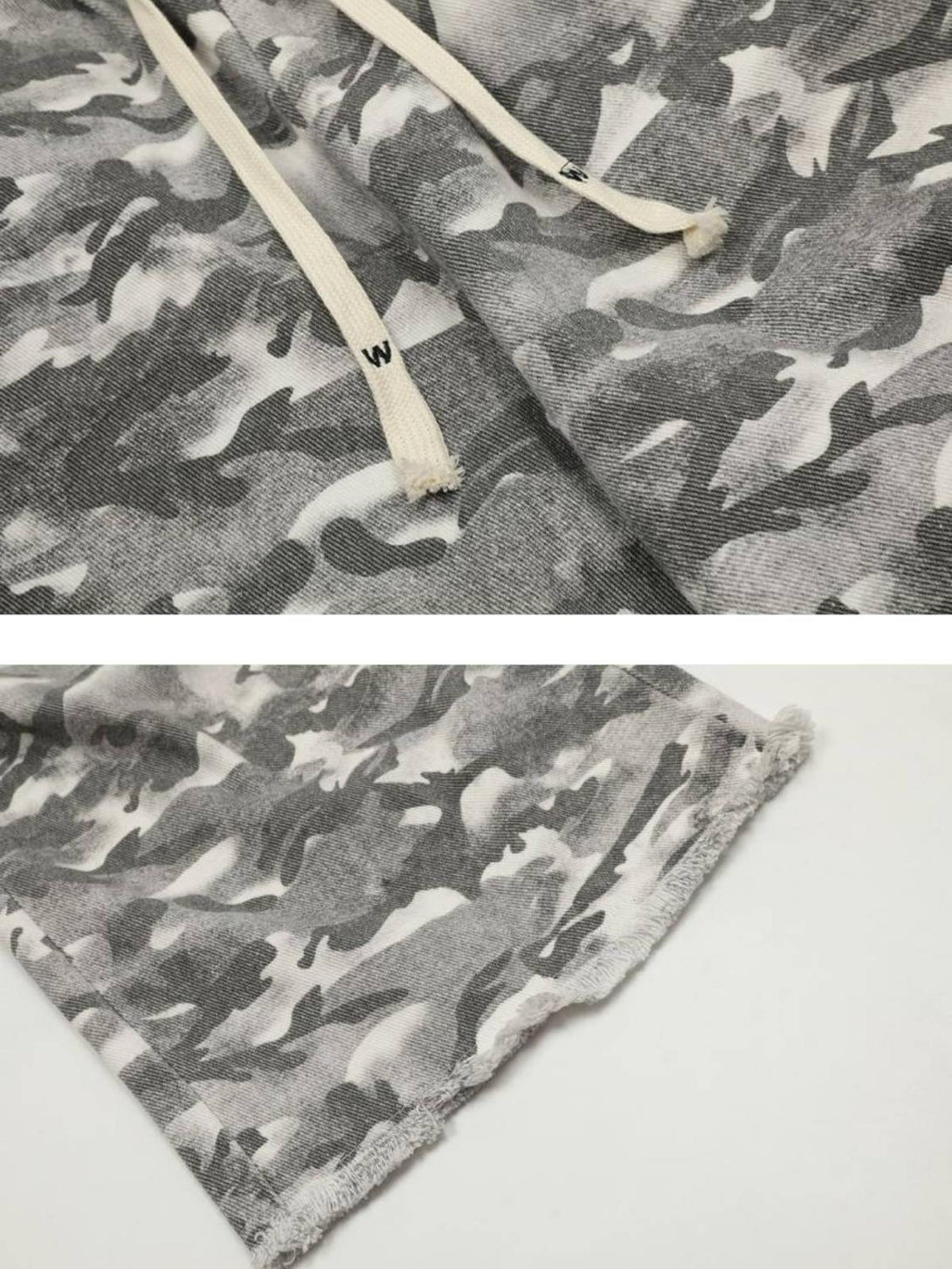 Detailed fabric and design of TALISHKO's retro camouflage pants, featuring drawstring detail.