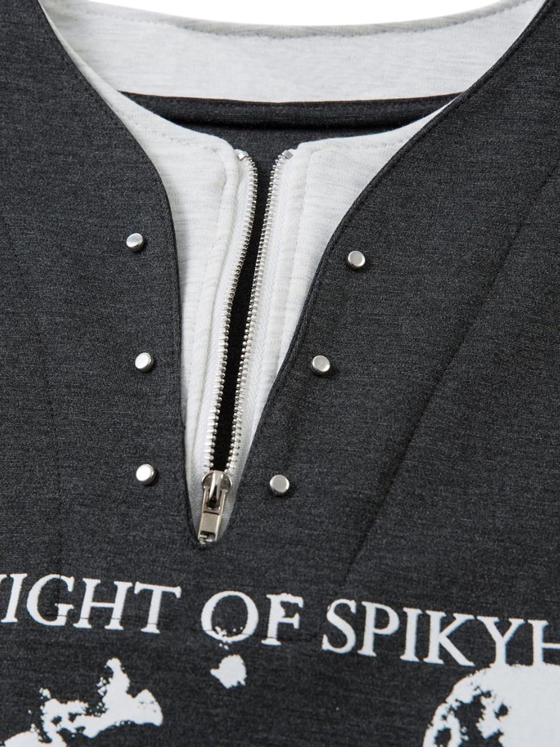 A detailed view of the zipper and graphic design on a faux two-piece T-shirt by TALISHKO.