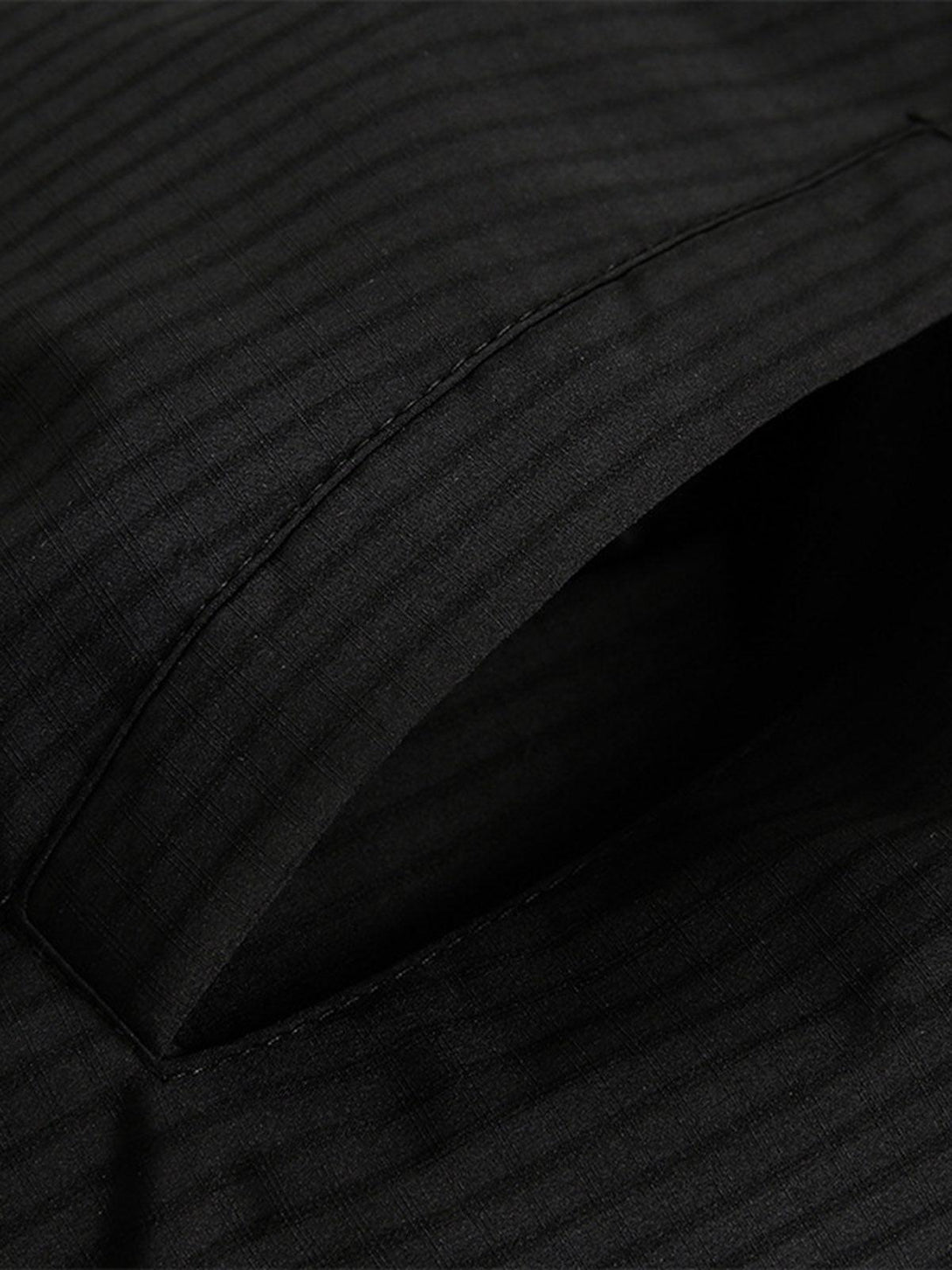 Detailed stitching and texture of the TALISHKO fleece bomber jacket, showcasing quality craftsmanship.