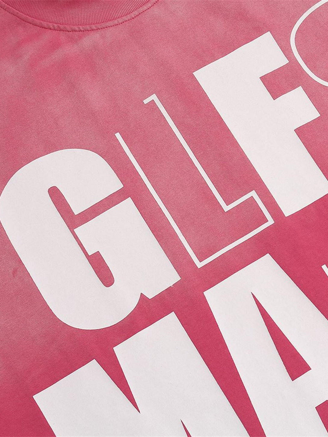 Zoomed-in view of TALISHKO retro gradient T-shirt, highlighting bold white lettering on pink.