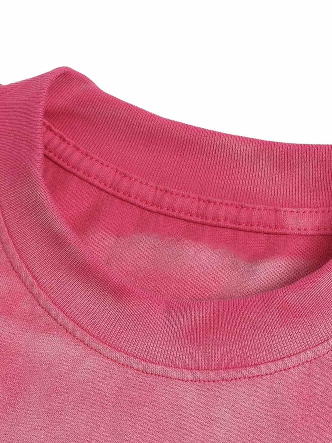 Ribbed neckline detail of a vibrant pink TALISHKO retro gradient graphic T-shirt.