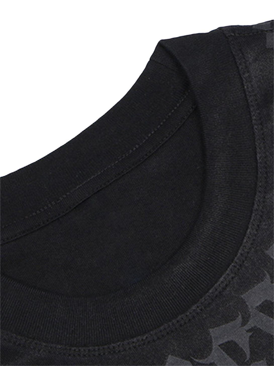 Focusing on the neckline detail of TALISHKO's black T-shirt, highlighting its soft fabric.