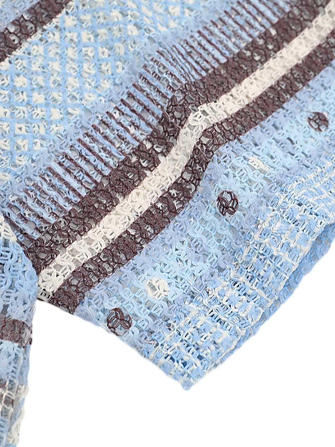 Intricate texture and pattern showcased on a retro striped polo shirt by TALISHKO.