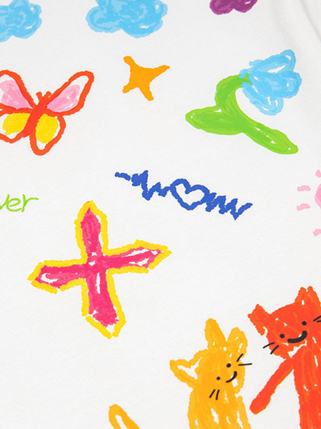 Close-up view of a TALISHKO T-shirt showcasing vibrant, playful hand-painted graffiti designs.