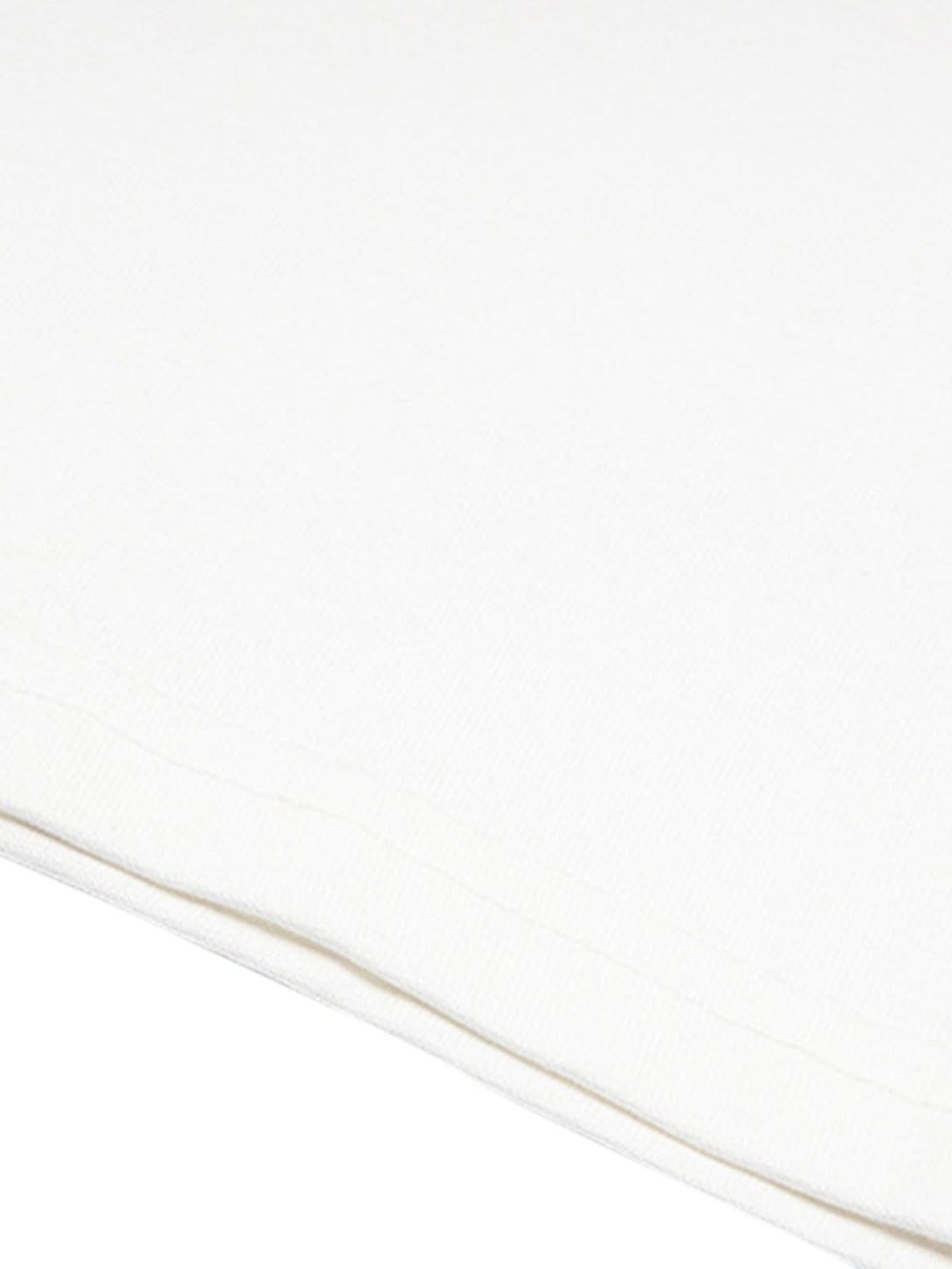 Detailed fabric and stitching on a white T-shirt by TALISHKO, showcasing sleek craftsmanship.