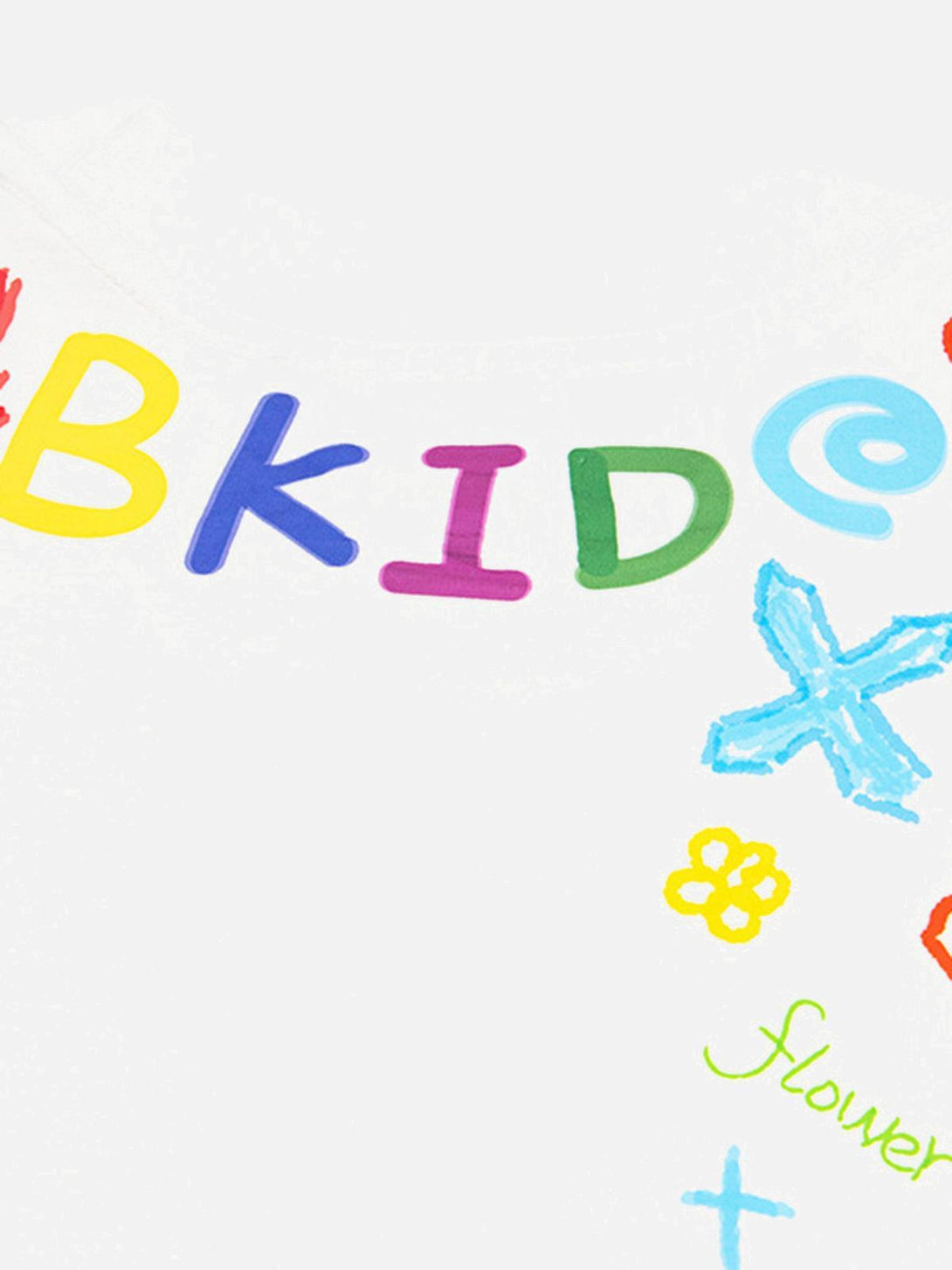 A close-up of a white T-shirt by TALISHKO highlighting colorful hand-painted graffiti details.