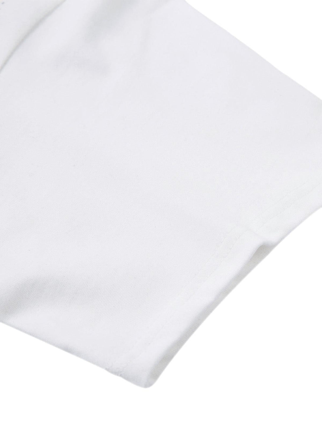 Detailed fabric and stitching of TALISHKO's retro T-shirt, highlighting its crisp white sleeve.