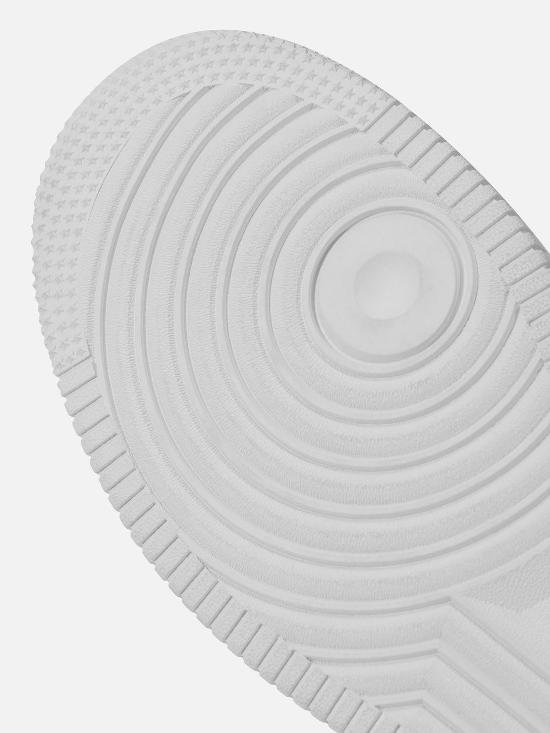 Focusing on the textured sole design of TALISHKO men's casual skate shoes for unique style.