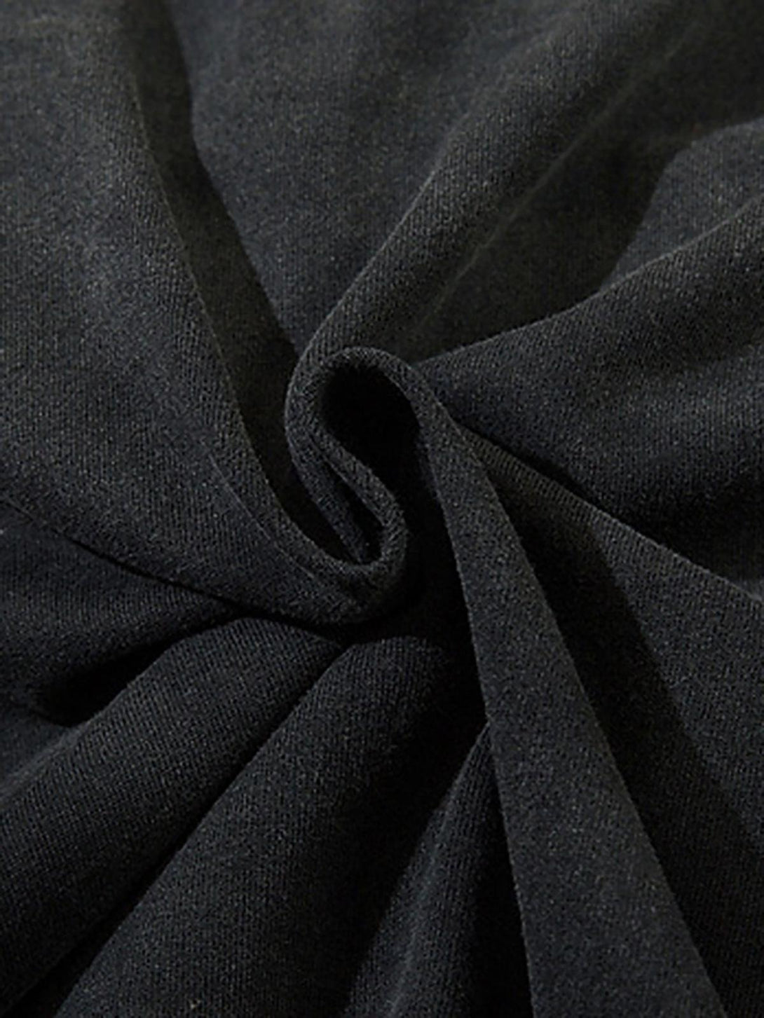 Zoomed-in texture of TALISHKO t-shirt fabric, emphasizing its high-quality material and style.