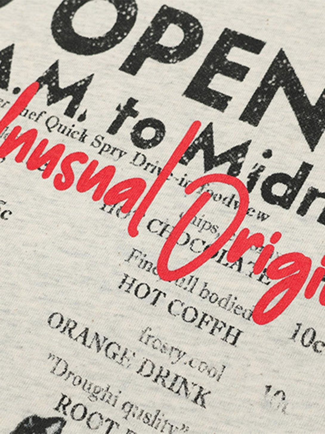 Zoomed-in view of TALISHKO T-shirt showcasing retro hip-hop graphics and unique typography.