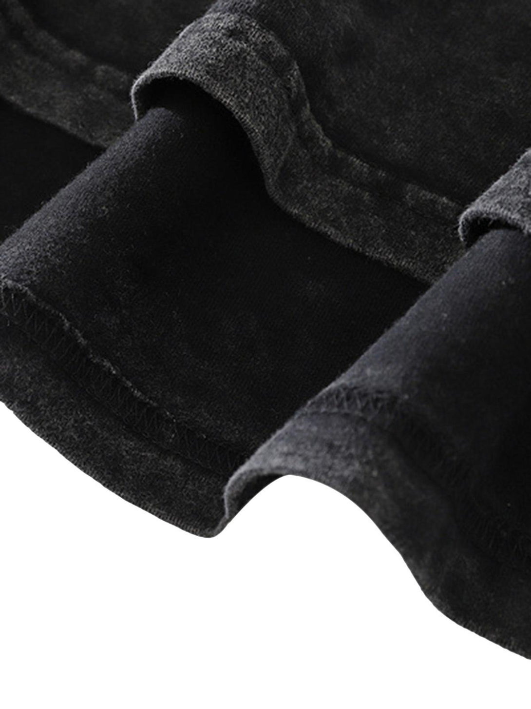 Detailed fabric and stitching of TALISHKO's retro hip-hop T-shirt, highlighting texture.