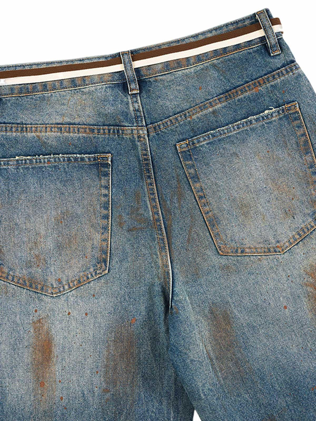 Rear view of TALISHKO ink-splashed jeans, highlighting the unique retro design and detailing.