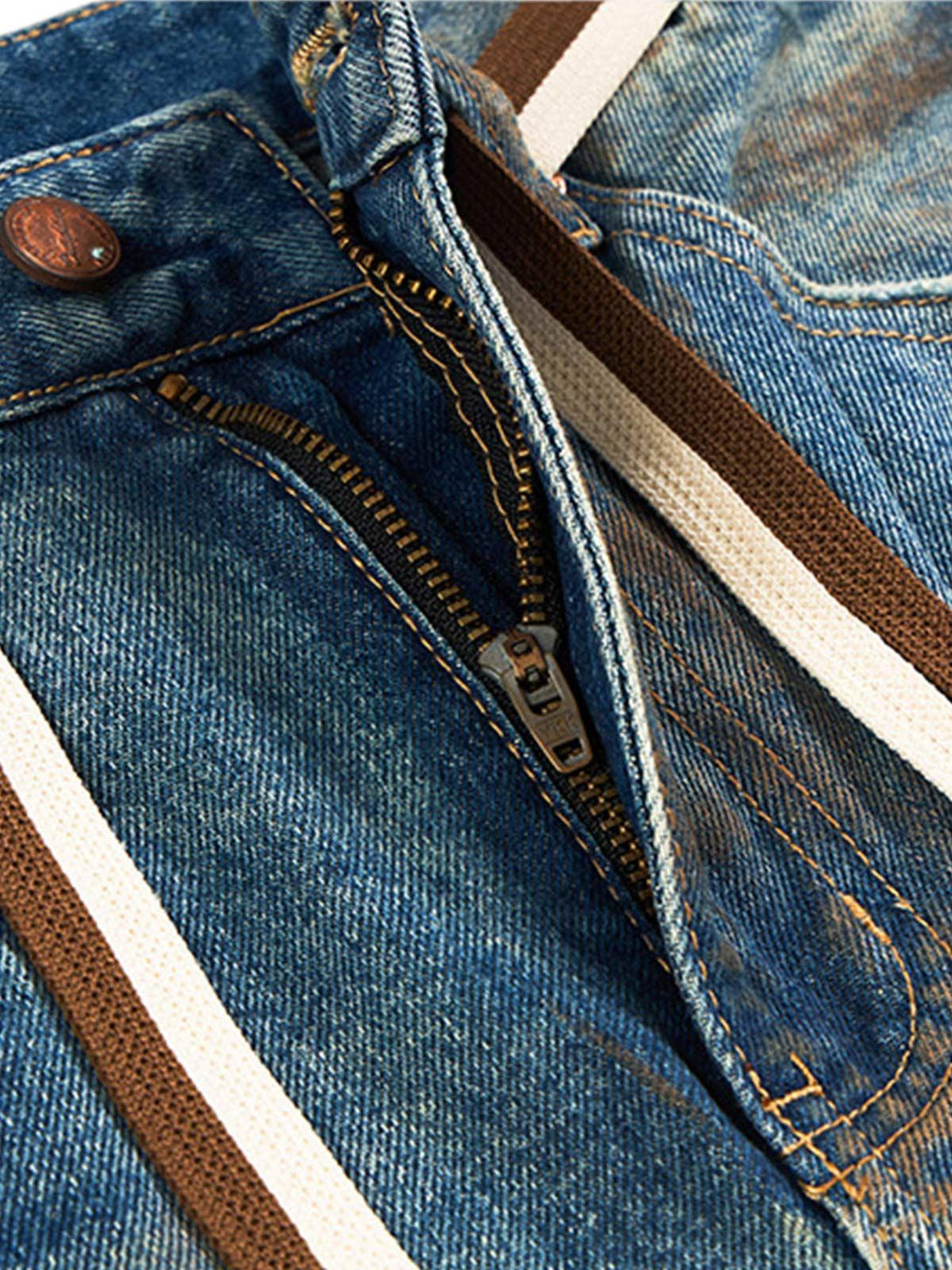 Detailed view of TALISHKO retro ink-splashed jeans zipper and stitching for a vintage look.