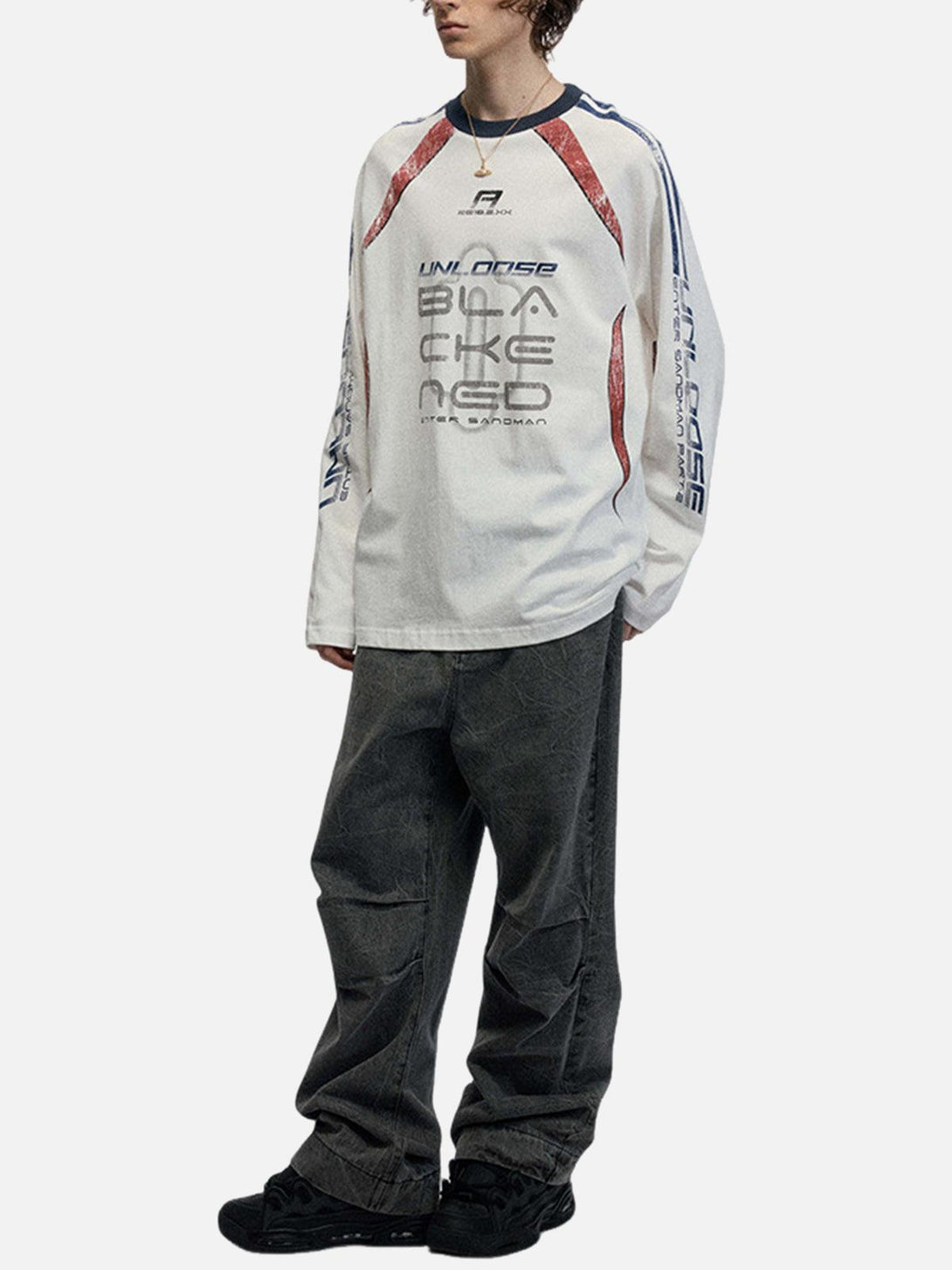 Model wearing a TALISHKO oversized long sleeves T-shirt with a retro jersey design.