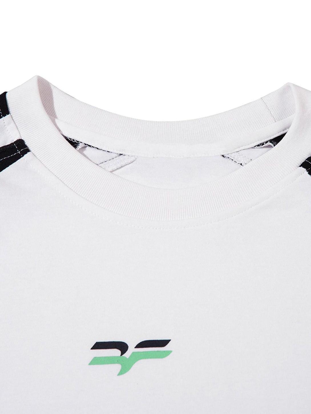 Detailed look at the TALISHKO retro jersey T-shirt's neckline, featuring a subtle logo design.