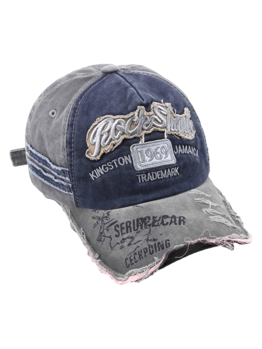 Side view of a distressed denim cap by TALISHKO, featuring vintage-style embroidery.