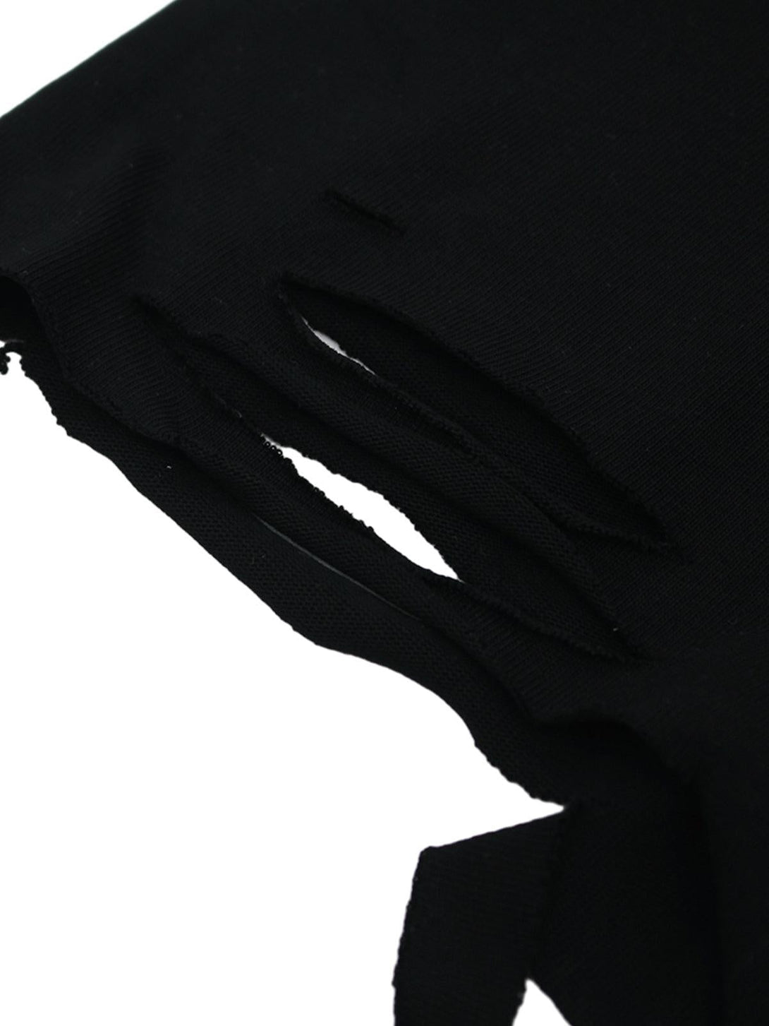 Intricate look at the distressed hem detail on a black retro graphic T-shirt by TALISHKO.