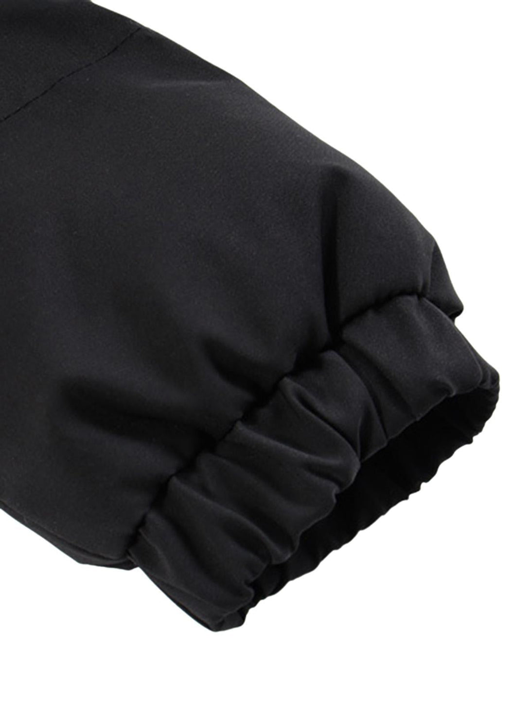 Elastic cuff detail of TALISHKO down jacket highlighting smooth fabric texture.