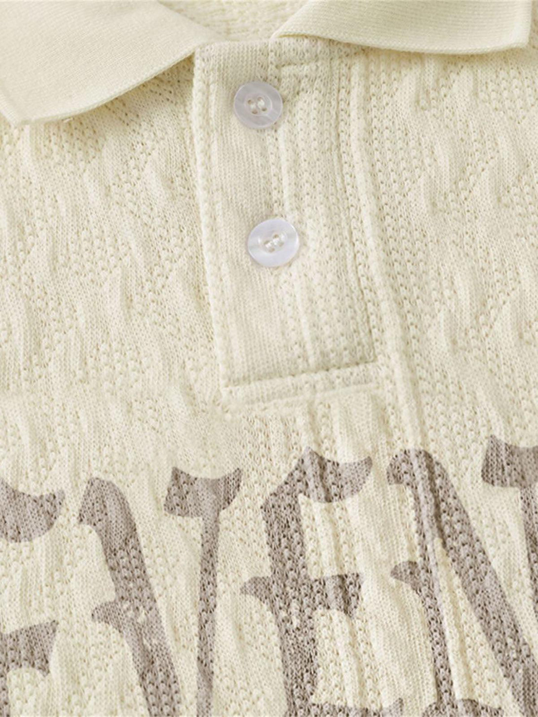 Detailed fabric and stitching on TALISHKO’s retro letter print polo shirt with lapel collar.